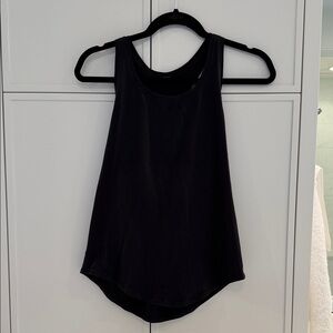 Lululemon size 4 Black Sleeveless Women's Tank. Loose fit.
